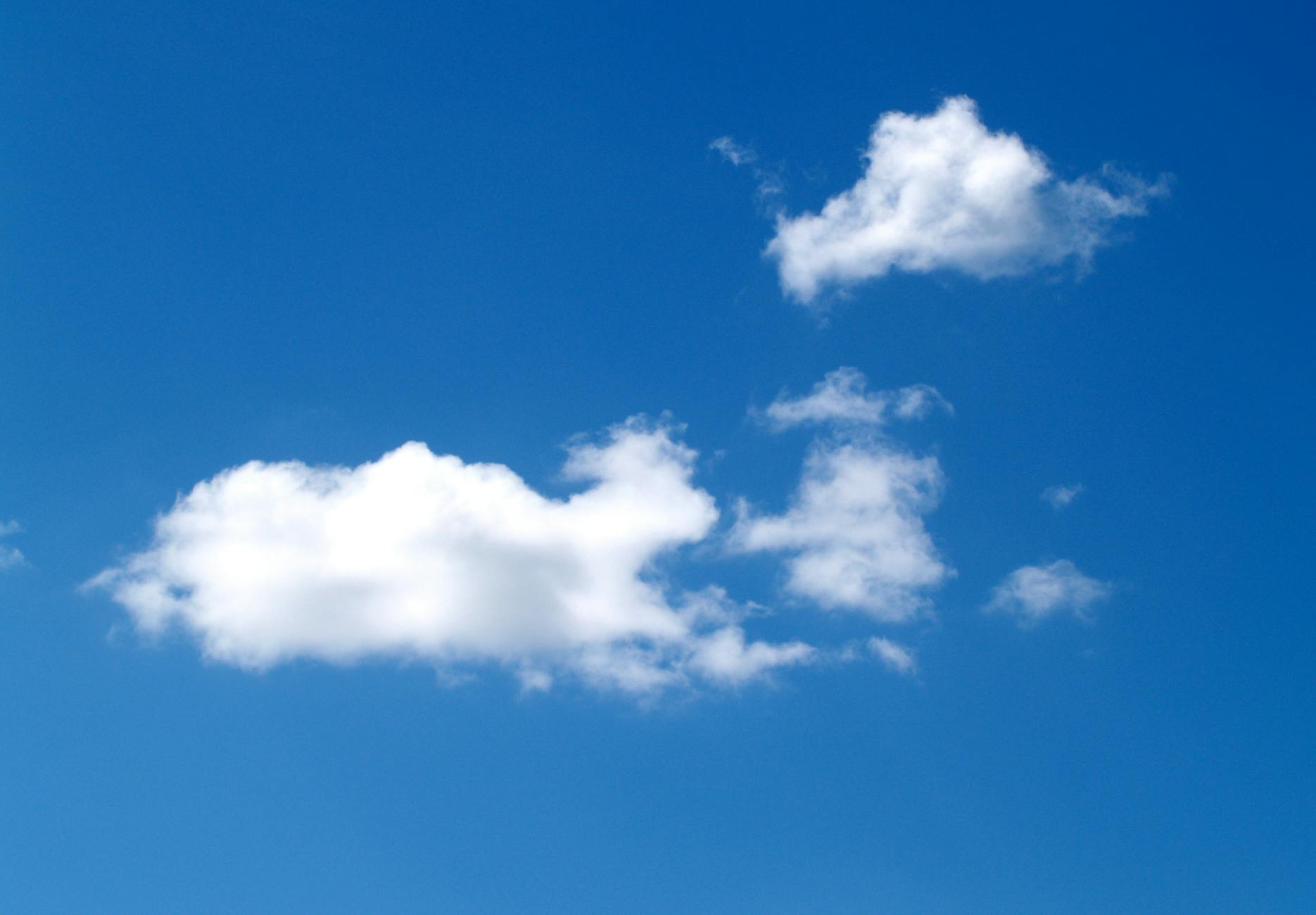 a photo of a blue sky with white clouds